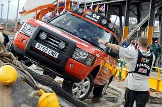 Tim Pickering (UK) guides his teammate Alberta Chiappa through the unique 4x4 course in Sydney